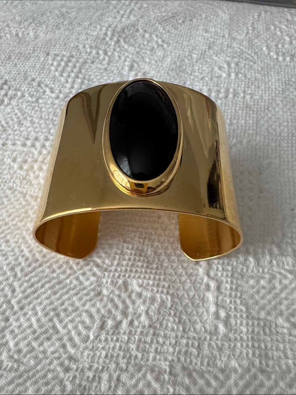 Monet Gold Cuff Bracelet with Black Oval Stone